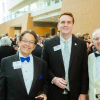 Jim Brooks with guests at Enrichment.